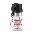 Compact pepper spray canister with safety clip and keychain attachment on white background